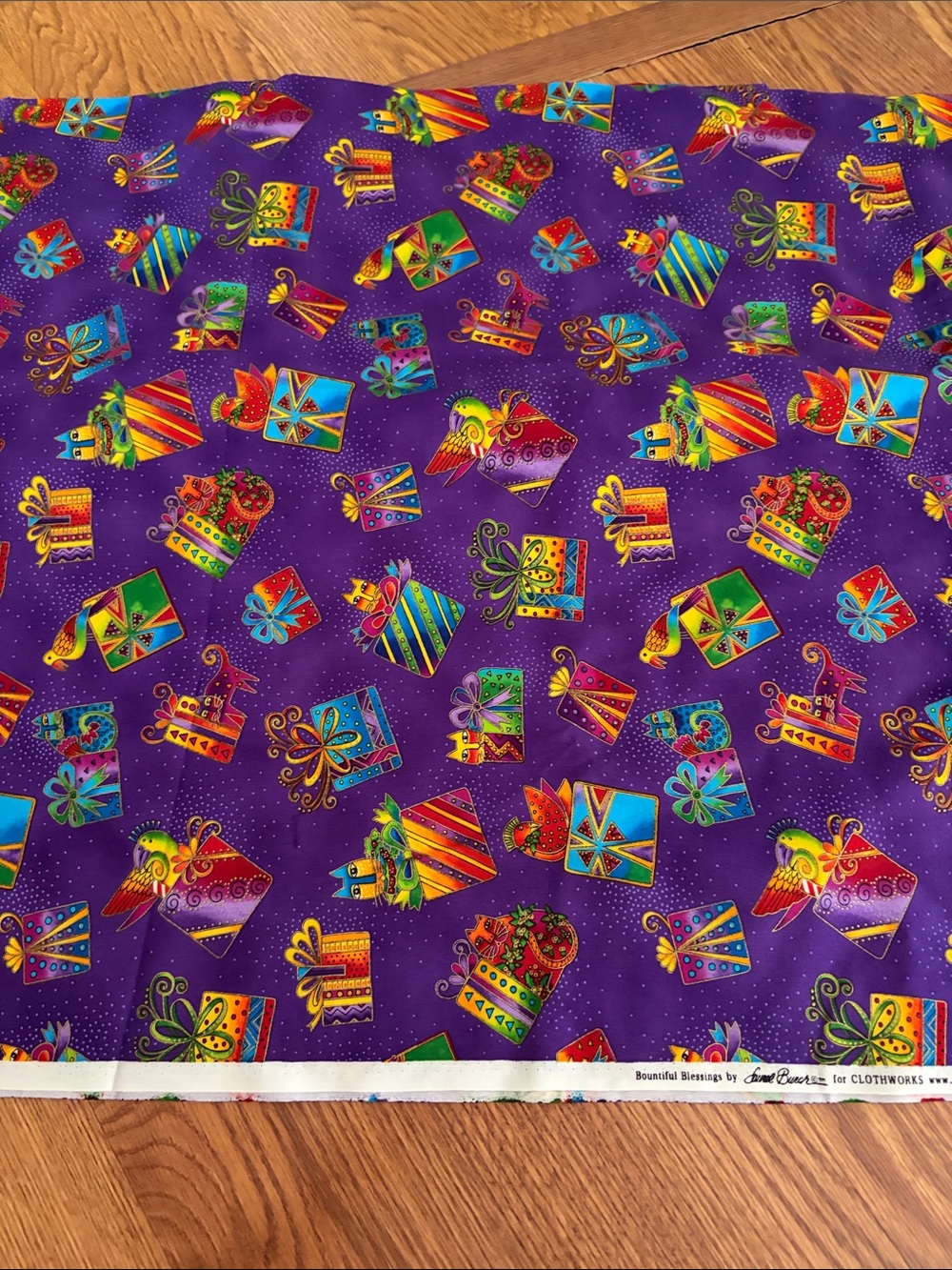 Laurel Burch Purple Fabric with Colorful Gift Motifs